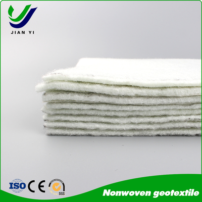 Geotextile non tessuto a filamenti corti: il cavallo di battaglia conveniente che protegge ogni centimetro del vostro progetto Sotto-título: Economia e affidabilità • Separazione essenziale • Filtrazione affidabile